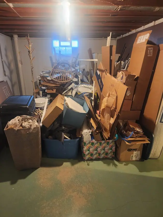 Roll-off dumpster container at job site for Yard Waste Dumpster Rental in Cottage Grove